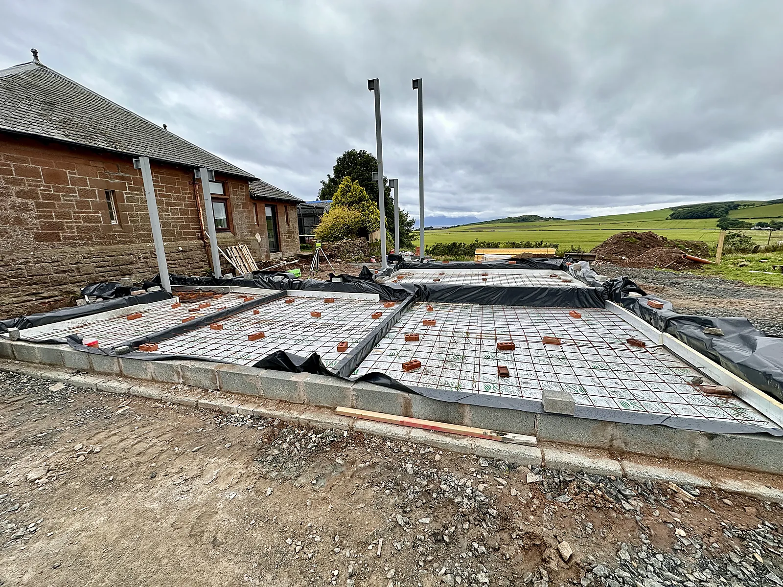 Insulated floor slab with membrane laid on a Cutwood Joinery & Construction extension